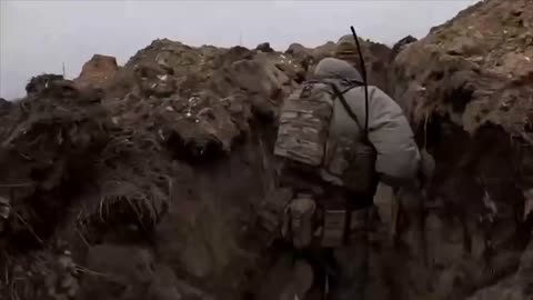 Sniper's Bullet Lands Just Above Entrenched Ukrainian Soldiers Head