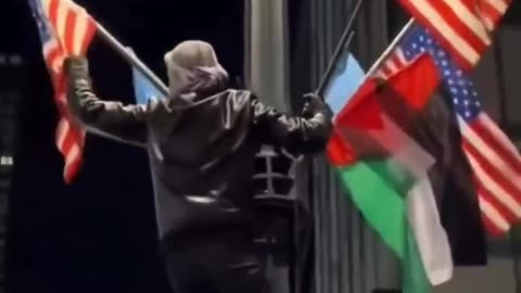 Muslims in New York tear down American flags - applause from Muslim crowd. Dark times for New York.