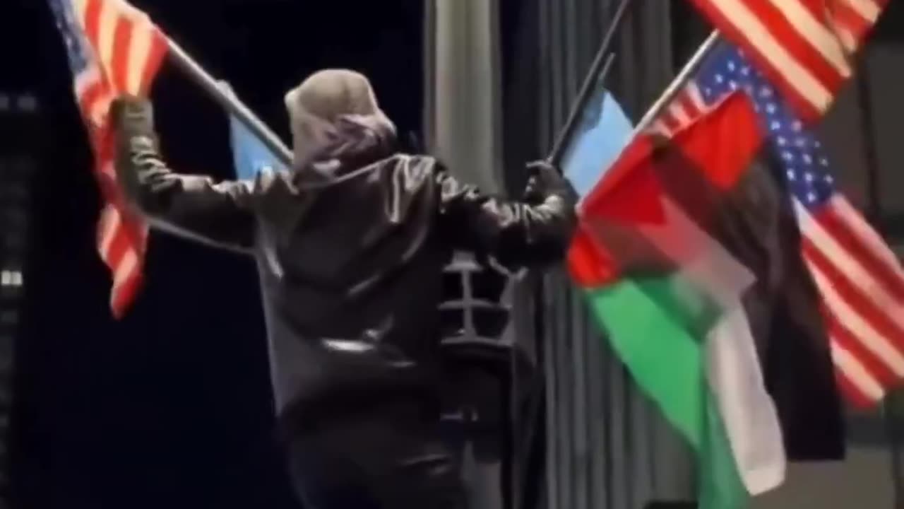 Muslims in New York tear down American flags - applause from Muslim crowd. Dark times for New York.