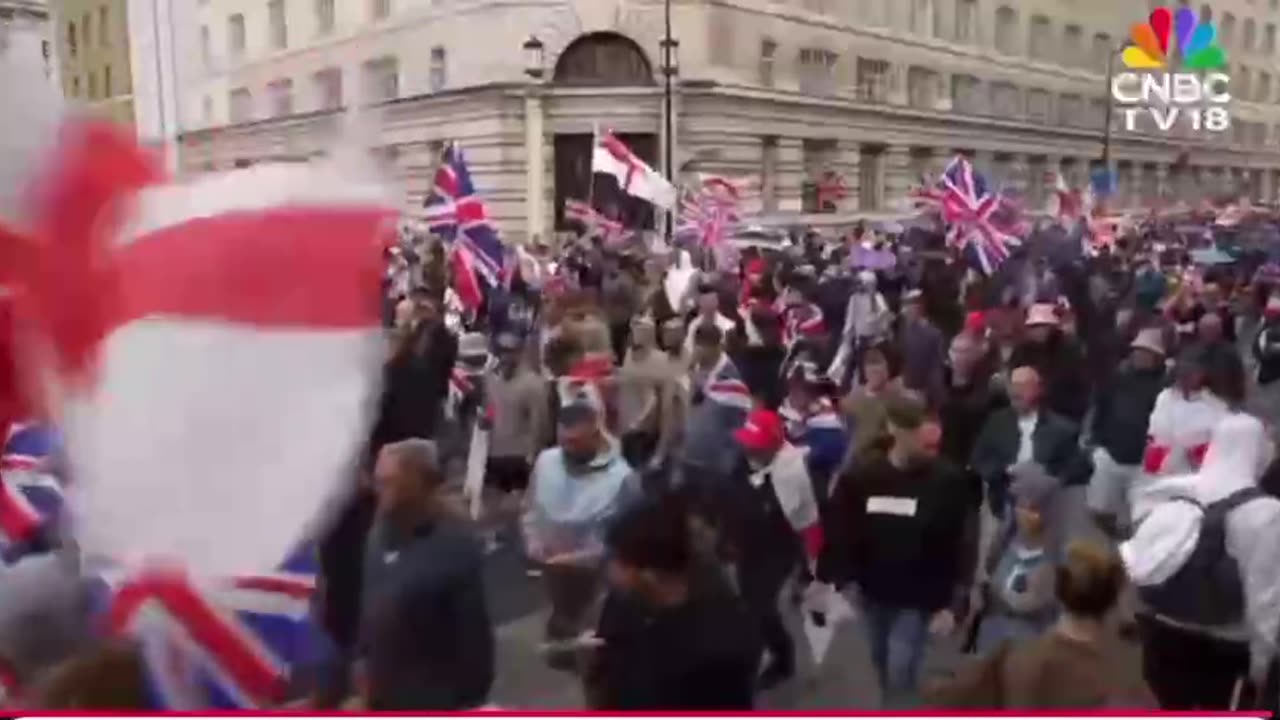 Thousands have gathered in central London for a march organised by activist Tommy Robinson