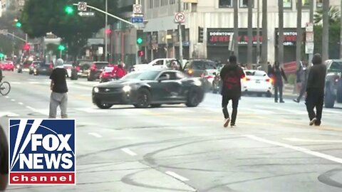 Rioters do donuts around the streets of LA