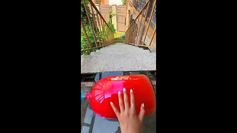 Incredible different colours of bottles falling from stairs to check hardness