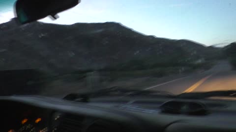 Joking about the big black fence we passed on this road