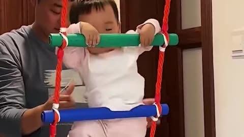 Skilled baby climbs the ladder like a real pro!.hd