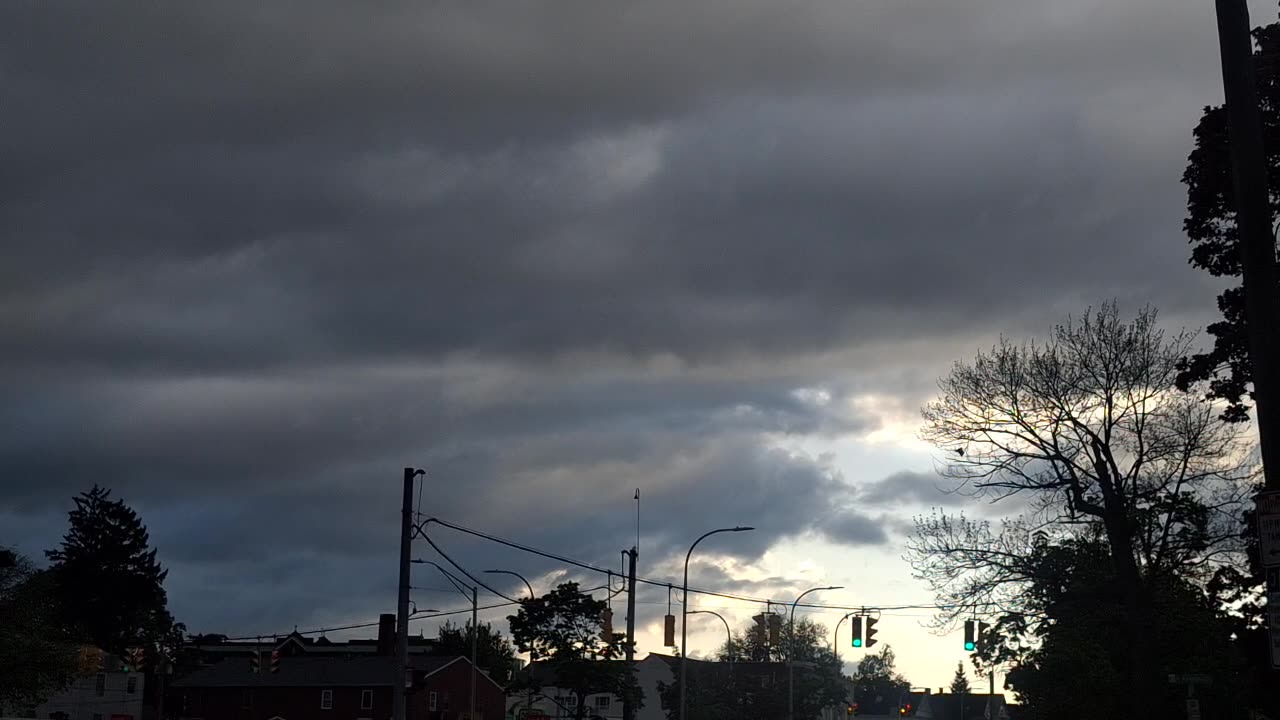 Layers of "clouds" in the atmosphere blocking the direct sunlight