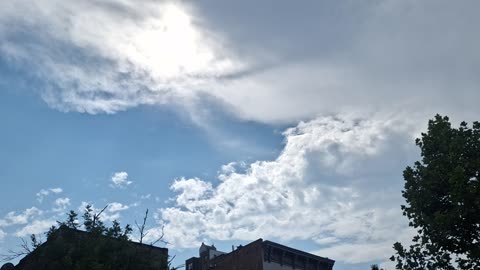 Created material(fake) in the atmosphere blocking the white sun(blue hue and the yellow sun