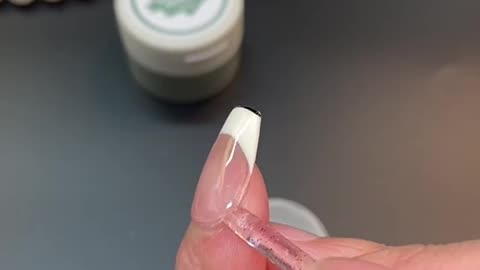 How to apply nail adhesive