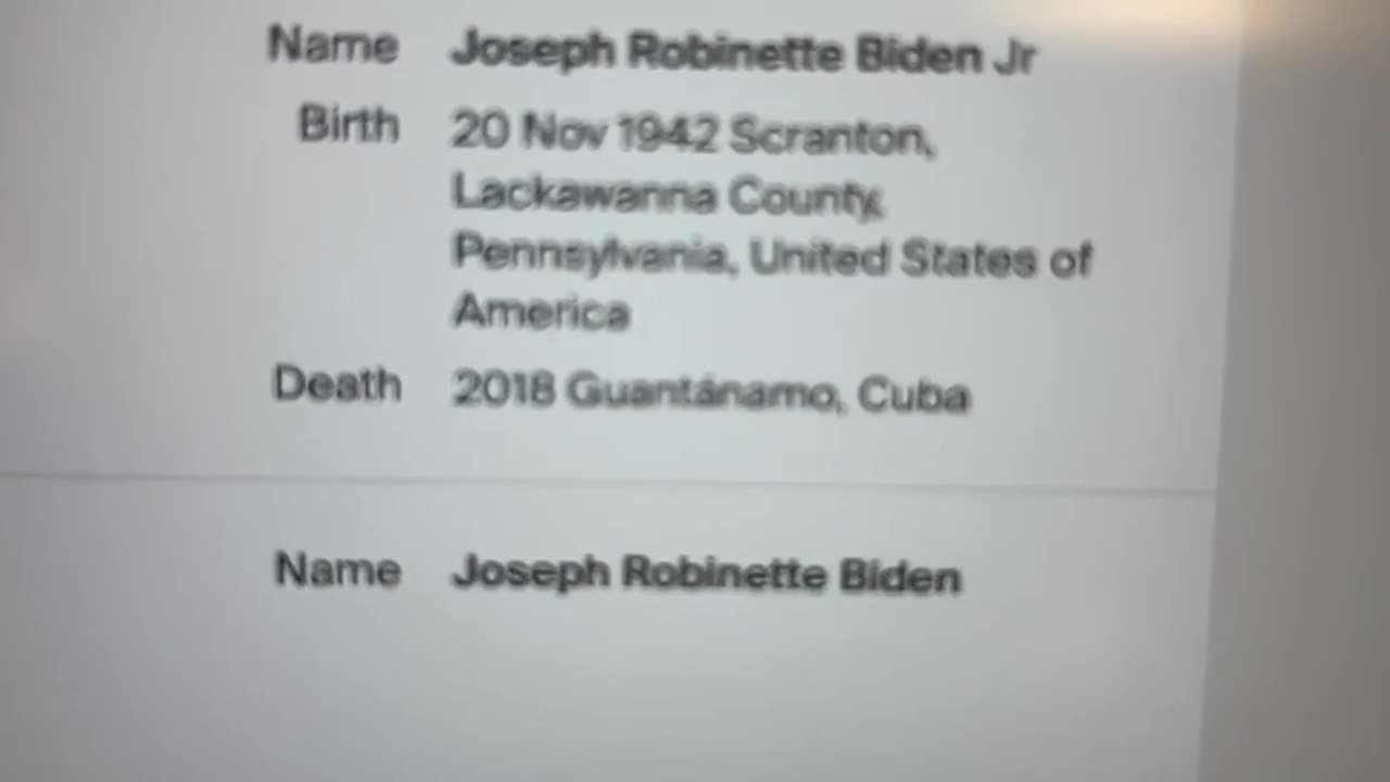 ANCESTRY.COM~SHOWING JOE BIDEN OBITUARY AS “2018” PURPORTED DEATH IN GUANTANAMO CUBA