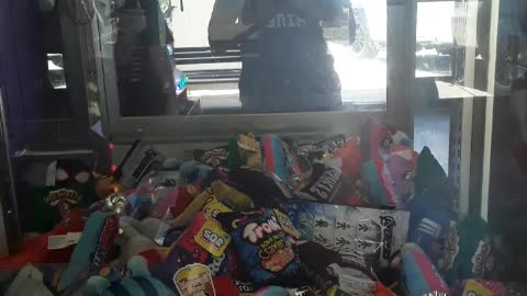 Hubby Poo vs. The Claw Machine