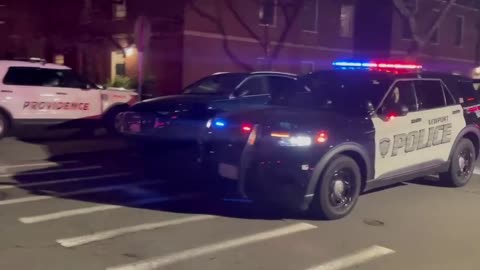 SWAT teams continue to arrive on Thayer Street in Providence as the manhunt