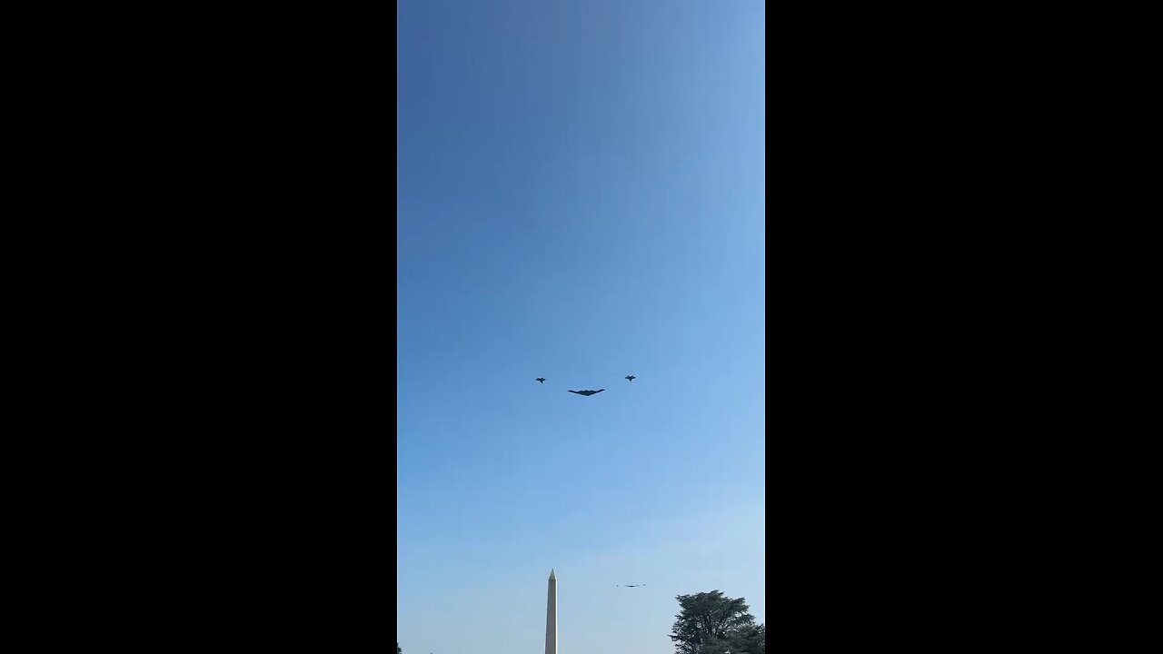 B-2 bombers, escorted by fighter jets, soar above the White House as President Trump signs the "BBB"