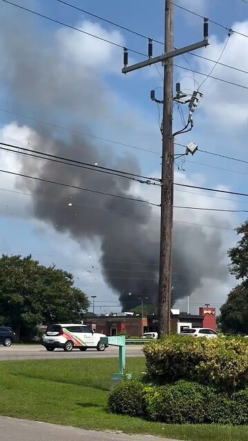 Three firefighters were injured while responding to a building explosion in