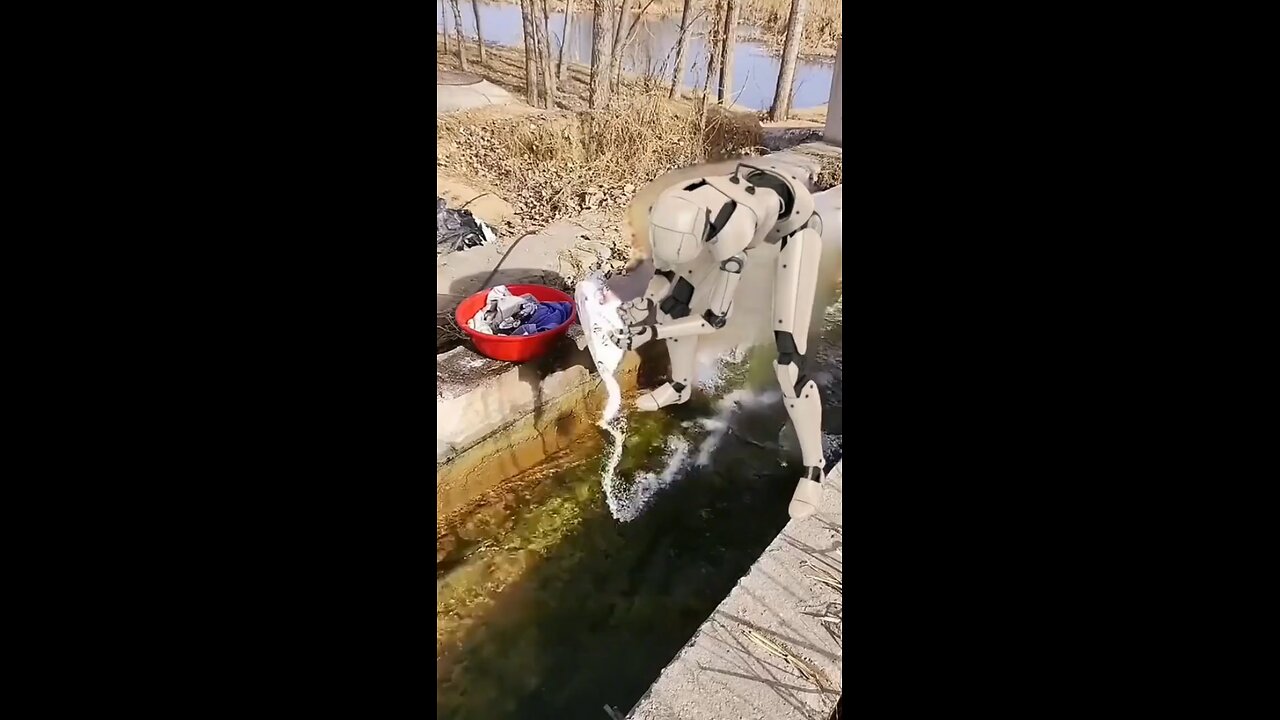🤖💧 A stunning blend of tradition and technology — a robot doing laundry in a flowing stream, as if