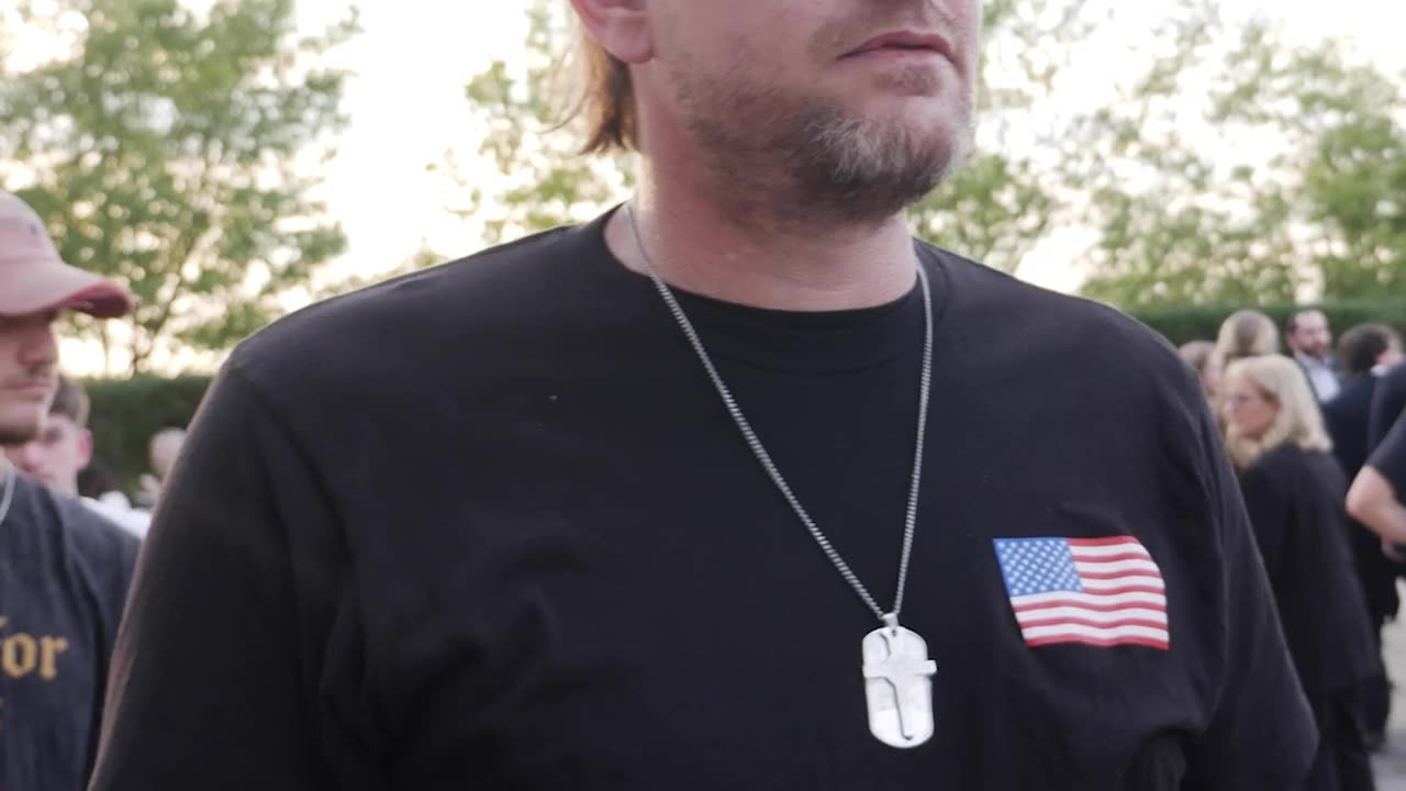 Mourner: People Celebrating Charlie's Assassination Are "Demons"