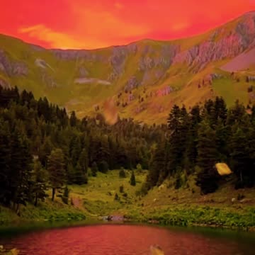 Evening's Embrace: Nature's PeacefulMountain Lake.