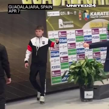 Young Ukrainian karate athlete walks off podium to avoid photo with Russian