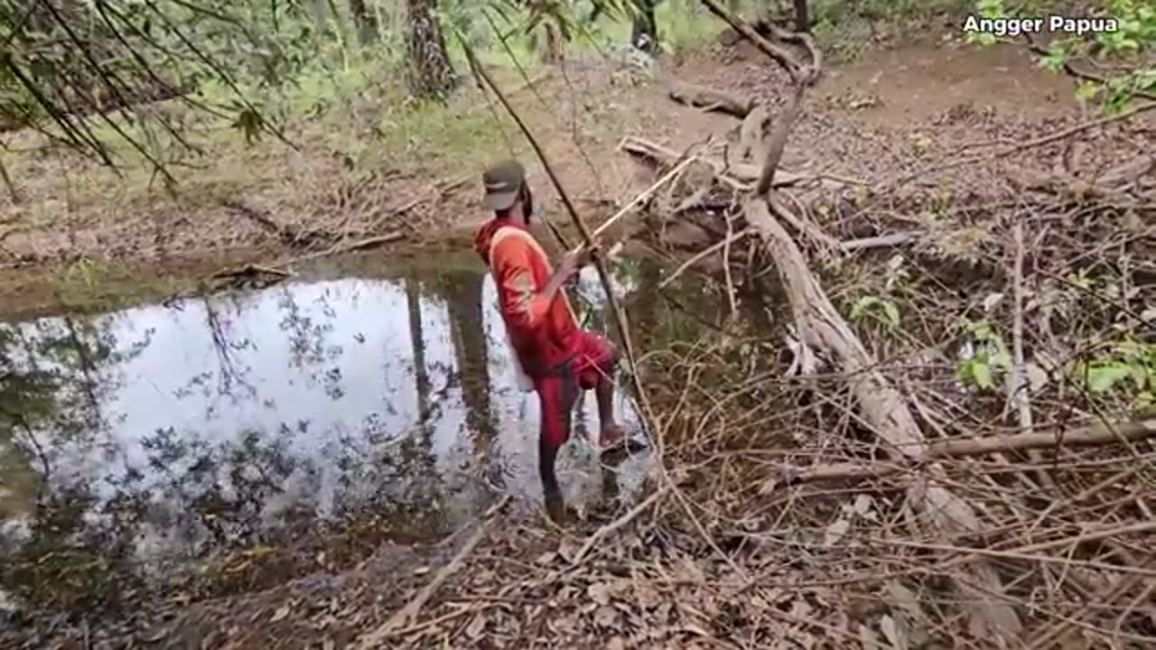 Primitive Archery and Grilling Fresh Fish in the Untouched Forests of Papua!