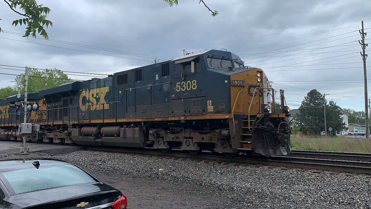 CSX Trains 5308 and 5342 speed along the rails