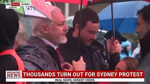 Jewish controlled Assange heading Free Palestine staged all actors the eyes and ears of the state