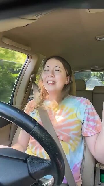 🚘💥 Irony in Motion: Woman Crashes Car After Singing 'Hit Me Baby One More Time'