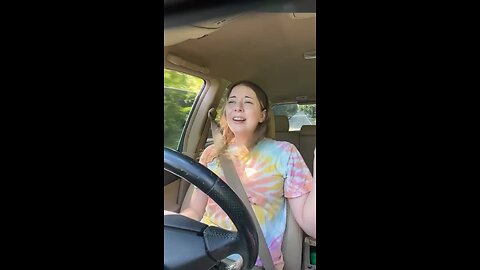 🚘💥 Irony in Motion: Woman Crashes Car After Singing 'Hit Me Baby One More Time'