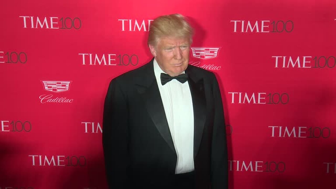 SUITED UP: Trump Walks the Red Carpet in Style