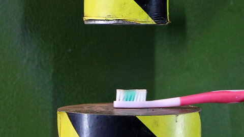 Toothbrush vs Hydraulic Press