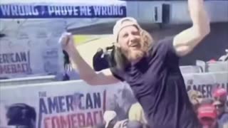 This guy seems awfully happy Kirk was shot. Is he signaling someone?