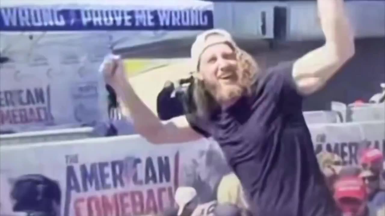 This guy seems awfully happy Kirk was shot. Is he signaling someone?