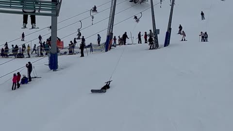 Snowboarder Smooths Out T-Bar Ski Lift Ruts