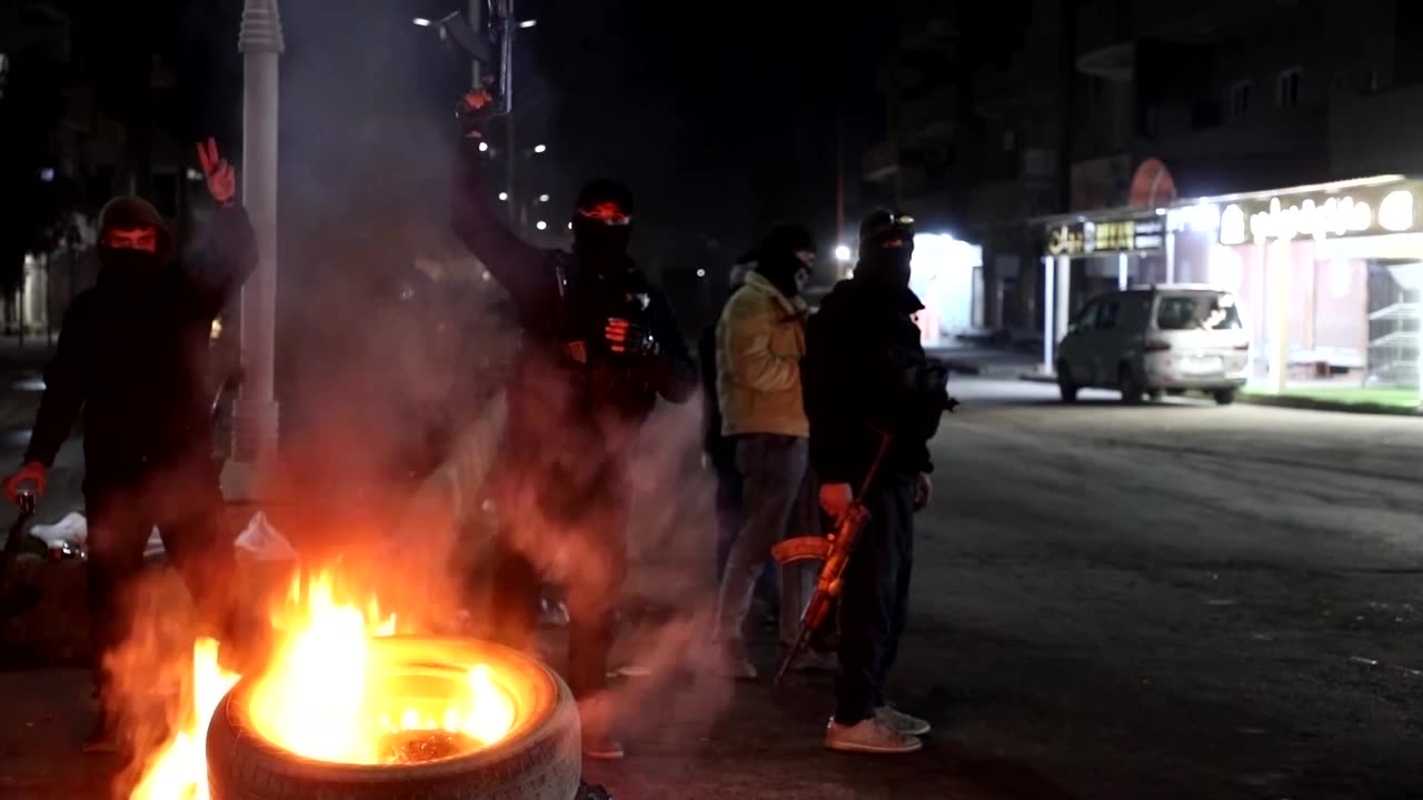 Kurdish forces agree to merge with Syrian state, easing tensions