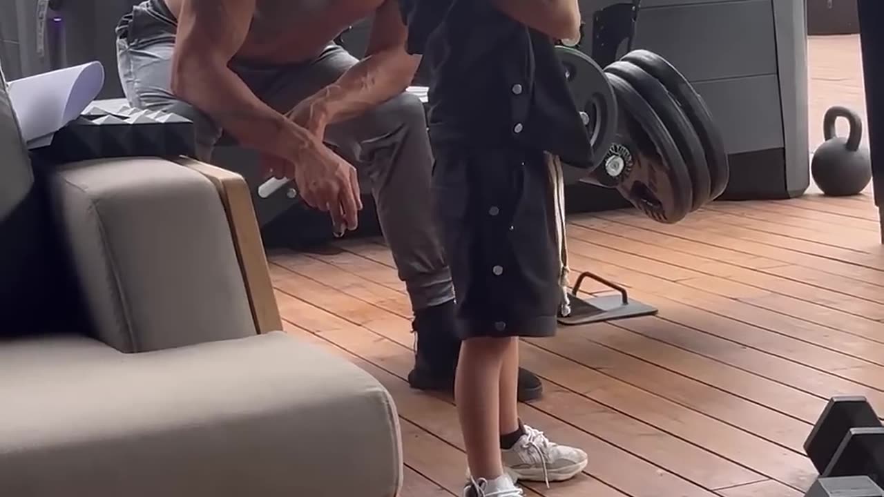 Andrew Tate training his son