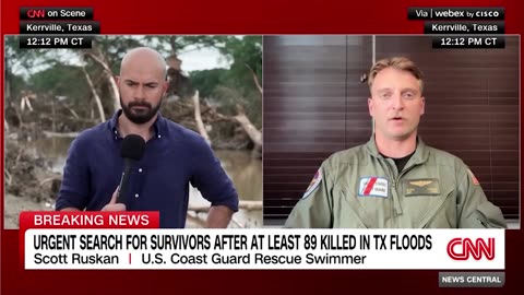 CNN interviews a rescue swimmer who is recognized for having saved 165 lives during floods.