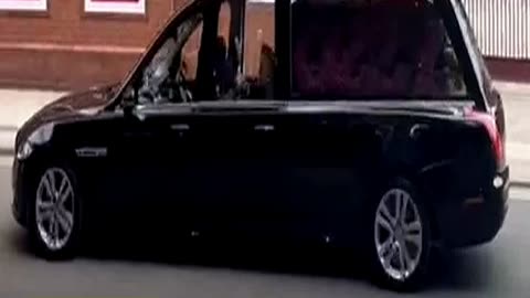 Breaking Ozzy Osbournes Coffin Adorned with Flor