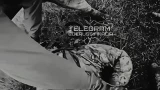 Ukrainian Soldiers Prepare Russian POW for Transport While Searching Another