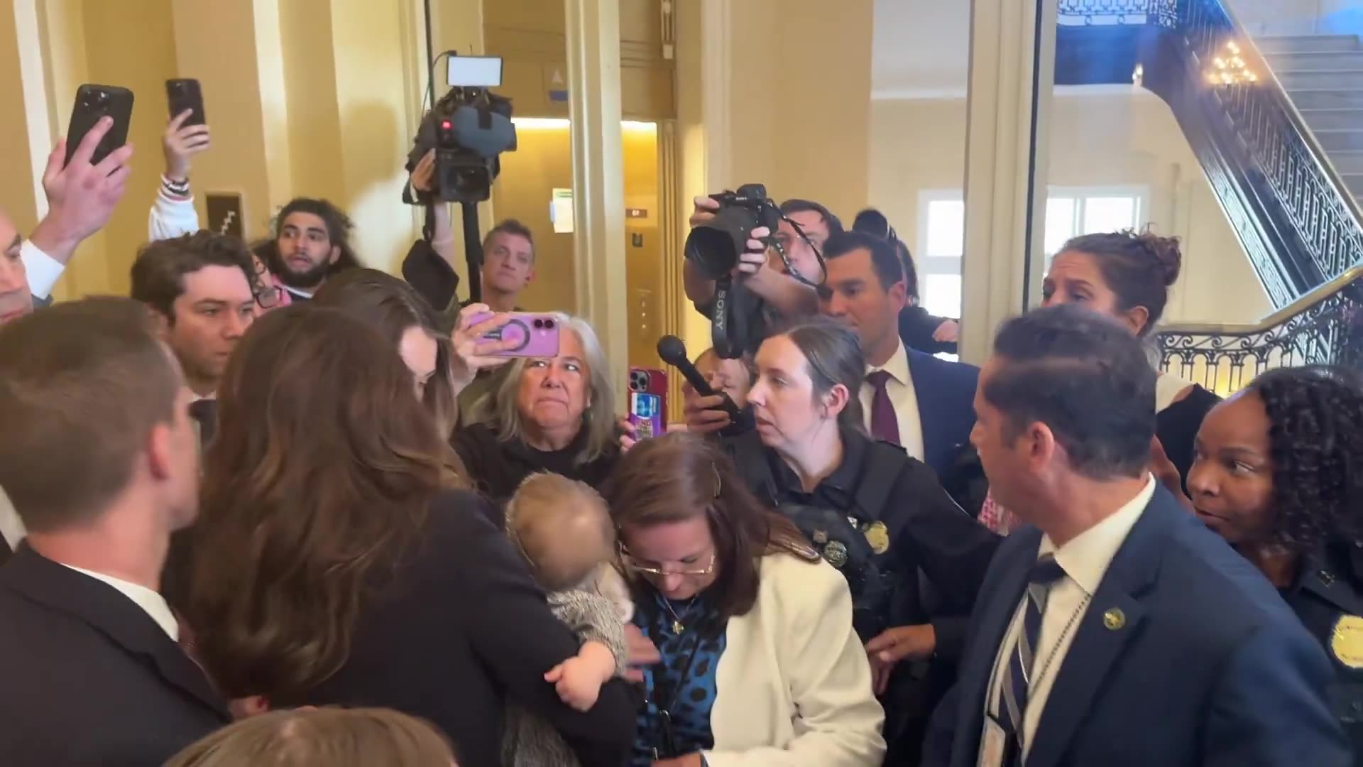 Kristi Noem Mobbed by Crazed Leftists While Holding Grandbaby After Committee Testimony