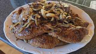 Steak, Potato and grilled onion dinner.