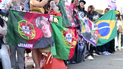 Fans greet BTS members Jimin and Jungkook after military discharge