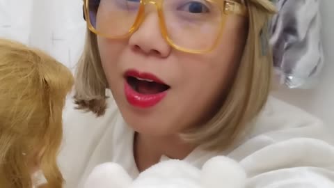 Talking to my doll instead of the camera