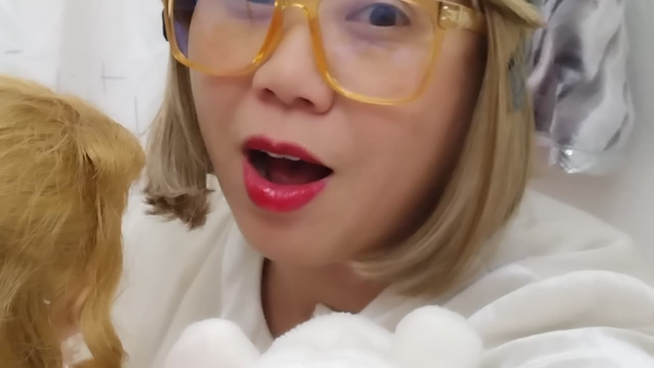 Talking to my doll instead of the camera