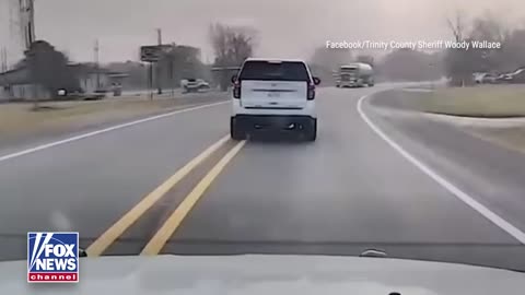 Dramatic video from Texas captures a car crashing into an 18-wheeler after officers