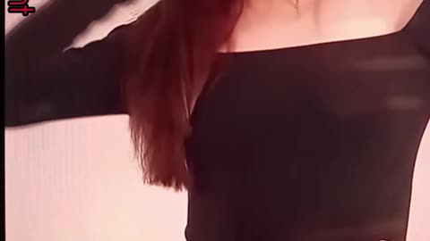 Cute little thing tries on black dress