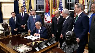 President Trump signs executive orders and congressional bills in the Oval Office