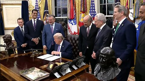 President Trump signs executive orders and congressional bills in the Oval Office