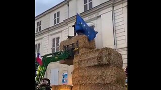WHOA! French farmers really angry! Take down EU flag & replace w/ political mannequin