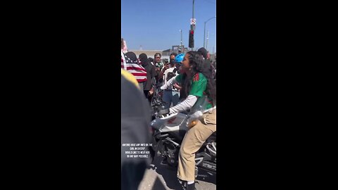 An anti-ICE rioter on a motorbike charges into LAPD riot police, assaults an officer