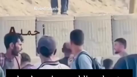 An American soldier shoots at people seeking help in the southern Gaza Strip.