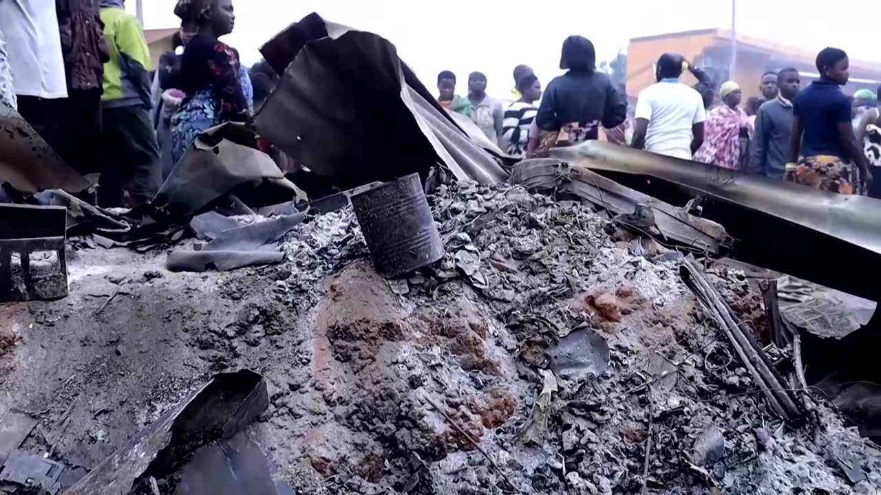 Rebels armed with machetes kill at least 52 in eastern Congo