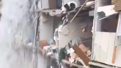 Widespread flooding causes building to partially collapse in Fairmont