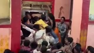 Thousands of savage Indians swarm a temple in India seeking to have their wishes granted